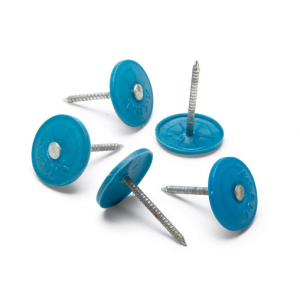 Five blue plastic cap fasteners in scattered positions on a surface. 